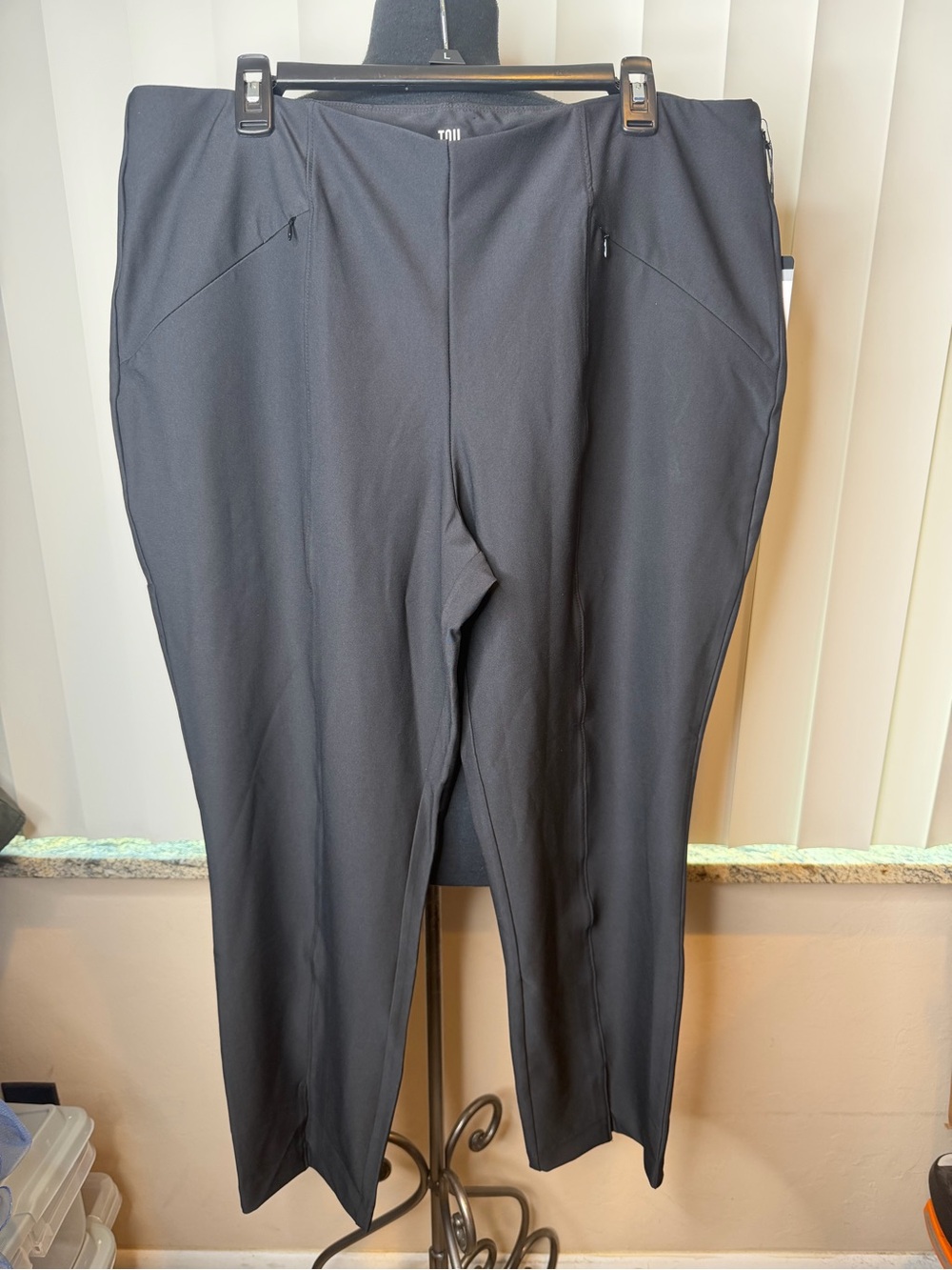 Tail Activewear pull-on ankle pants in the shade Onyx Black Size 18